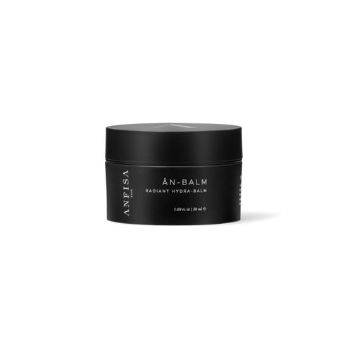 Black jar of ANFISA ÂN-Balm on a white background