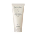 Tube of face reality I-mandelic face and body wash on a white background