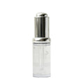 Clear skincare serum bottle with silver cap on a white background