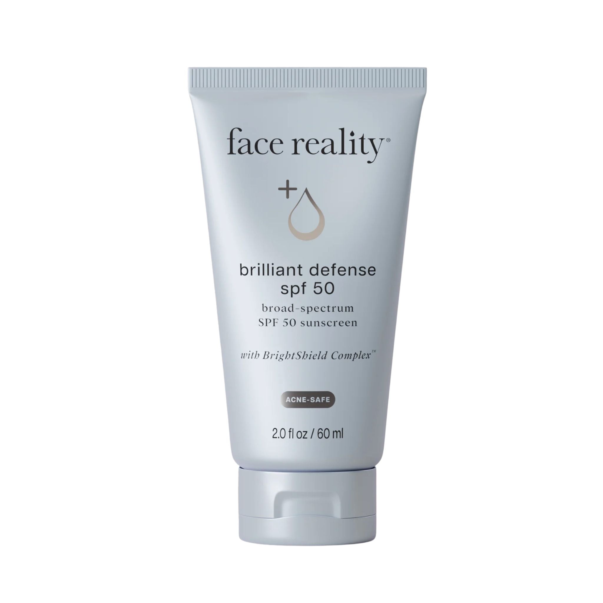 Tube of 'face reality' Brilliant Defense SPF 50 sunscreen on a white background